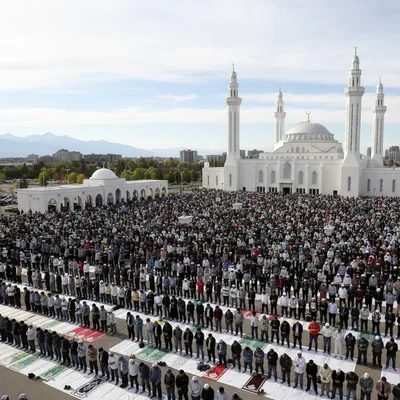 People filling the large prayer hall of Baitun-Nur Mosque for Eid al-Fitr, marking the end of Ramadan.